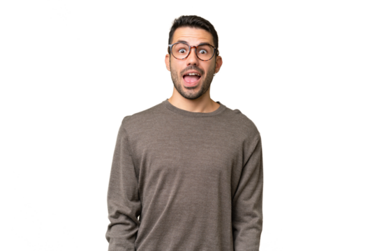 Young handsome caucasian man over isolated background with surprise facial expression