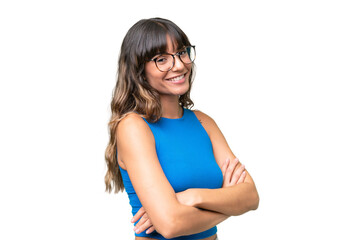 Young caucasian woman over isolated background with arms crossed and looking forward
