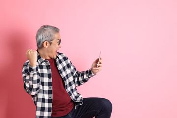 Fototapeta premium Asian Man on Pink
