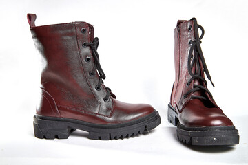 Female winter, autumn or spring brown leather shoes. Fashionable modern photography for a store, catalog, magazine or online