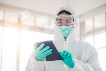 Fototapeta premium Healthcare concept, Doctor holding tablet technology in hospital treatment lab, Healthcare medical background