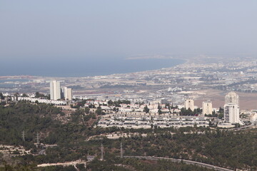 the cityscape of haifa city with the surrounding neighboring cities of akko and krayoot and the mediterranean sea