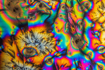 Extreme macro photograph of Vitamin C crystals forming abstract modern art patterns, when...