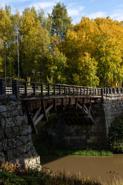 Halikko Old Bridge, built in 1866. Historic museum bridge in Salo, Finland with trees in autumn colors