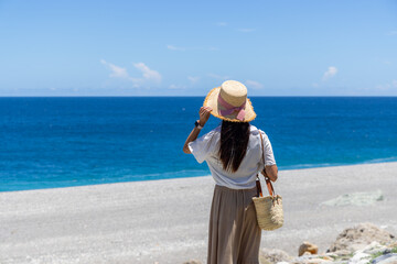 Fototapeta na wymiar Tourist woman in Qixingtan Beach in Hualien of Taiwan