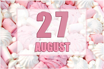 calendar date on the background of white and pink marshmallows. August 27 is the twenty-seventh day of the month