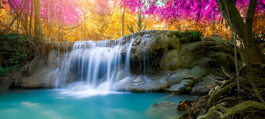 Amazing in nature, beautiful waterfall at colorful autumn forest in fall season	