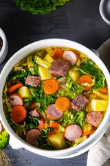 delicious savoy cabbage soup in white vase
