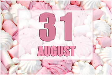calendar date on the background of white and pink marshmallows. August 31 is the thirty-first day of the month