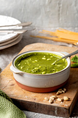 Pesto, sauce, and some ingredient, parmesan cheese, oil and nuts.