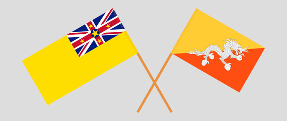 Crossed flags of Niue and Bhutan. Official colors. Correct proportion