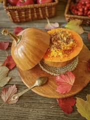 Vegan pumpkin porridge pudding sweet dessert healthy organic food on vintage table background