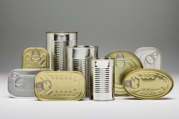 Set of stacked unopened cans