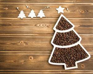 Happy New Year 2023. Christmas pine nuts in saucers in the form of a Christmas tree. Christmas...