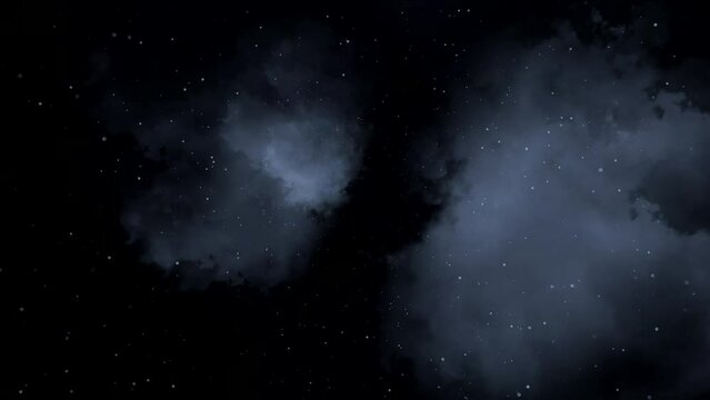 Night rain. Drops falling from the sky on the background of clouds. View from Earth.
