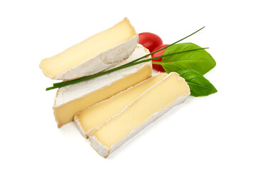 Brie cheese. Camembert cheese. Fresh Brie cheese with basil leaves and cherry tomatoes. Italian, French cheese, isolated on white background.