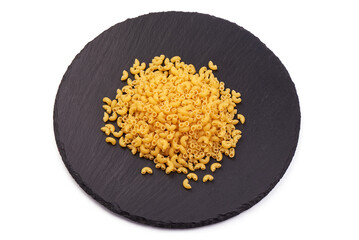 Raw macaroni pasta, isolated on white background.
