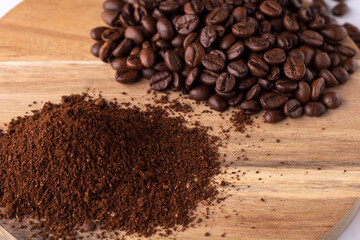 coffee piles of coffee beans on a wooden board