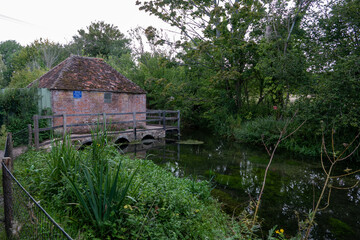 The Eel House astride the River Alre Alresford Hampshire England