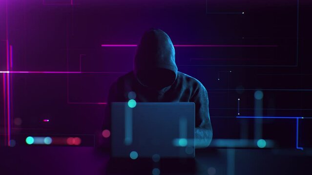 Unrecognizable Hacker in Hoodie Working on Laptop in Digital Environment. Abstract Anonymous Man Typing, Hacking into Security Systems. Cybercrime and Internet Protection Technology Concept 4k UHD.