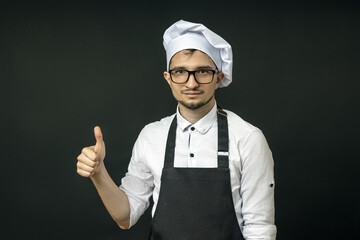 Naklejka premium the chef raised his thumb up showing a like sign.
