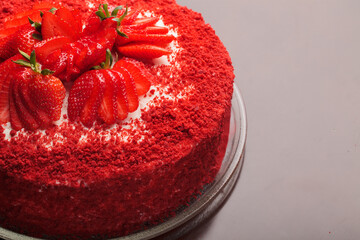 Beautiful red cake with strawberries and cream