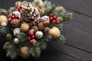Homemade Christmas or Christmas decorations made of Christmas tree and cones.