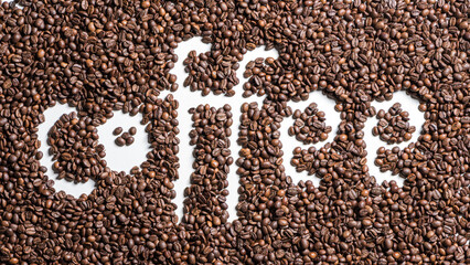 Obraz na płótnie Canvas word coffee from coffee beans