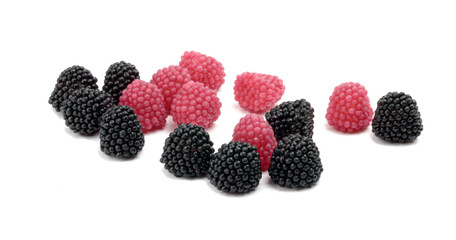 marmalade in the form of raspberries and blackberries on a white background