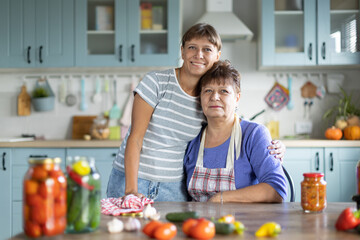 Obraz na płótnie Canvas Two women in the kitchen