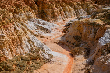 Landscape of multi-colored clay dunes. Mars on earth.