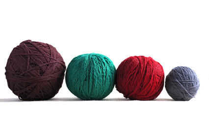 Balls of yarn in various colors. Isolated on white background.