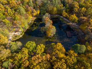 Dąbrowa Górnicza  Aerial View. Park Zielona ( Green Park ) at Autumn Time. Top Down View of Autumn Forest with Green and Yellow Trees. Upper Silesia Province, Poland.