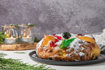 Bolo Rei or King's Cake is a traditional Xmas cake with fruits raisins nut and icing  on kitcthen...