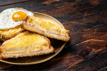 French toasts Croque monsieur and croque madame, grilled sandwiches on brioch bread with sliced...