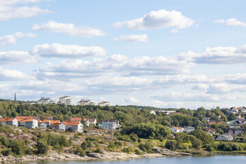 Fototapeta na wymiar View from the sea residential area Gothenburg's archipelago, Sweden, Europe