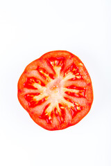 Tomato slice isolated on white background. Top view. 