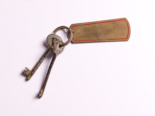 Keys with metal key tag on white