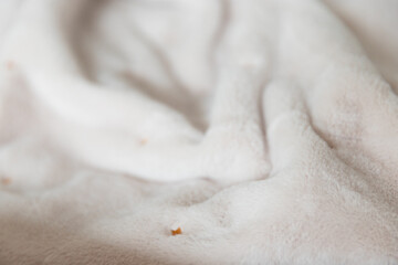 Close up of a pastel colored faux-fur baby blanket