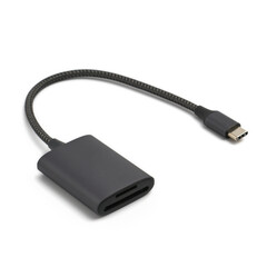 Metal card reader with type-с cord on white background, shallow depth of field