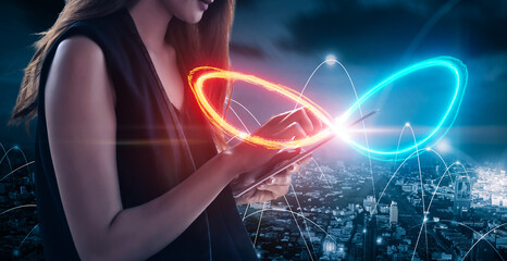 Businesswoman Virtual reality VR simulation infinity symbol connecting unlimited internet data usage speed, infinite data user storage cloud computing storage cyberspace network, blue background
