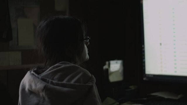 Young Female Office Employee Carries Out Daily Tasks at Her Desk 4K