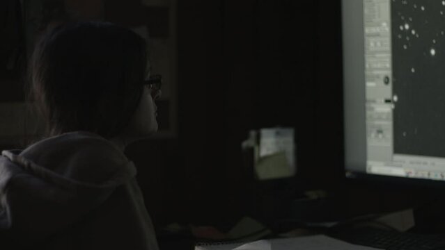 Young Female Office Employee Carries Out Daily Tasks at Her Desk 4K