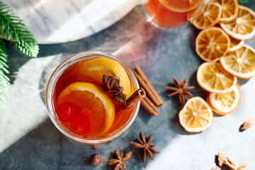 Christmas mulled wine with aromatic spices and citrus fruits. Traditional Christmas festive warming...