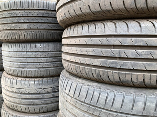 Obraz premium Used tires, stored in piles