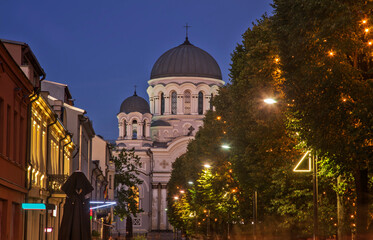 Fototapeta na wymiar Church of St. Michael the Archangel and Laisves (Freedom) alley in Kaunas. Lithuania