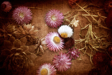 Top View of Dried Flowers Concept with Grainy Filters and Sepia