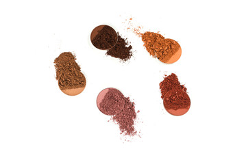 Eyeshadow crushed palette, colorful eye shadow powder isolated on a white background.