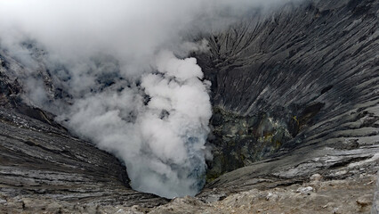 Mount Bromo an active volcano in East Java, Indonesia spewing smoke © Mihir Joshi
