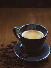 Coffee cup on a brown wooden table 